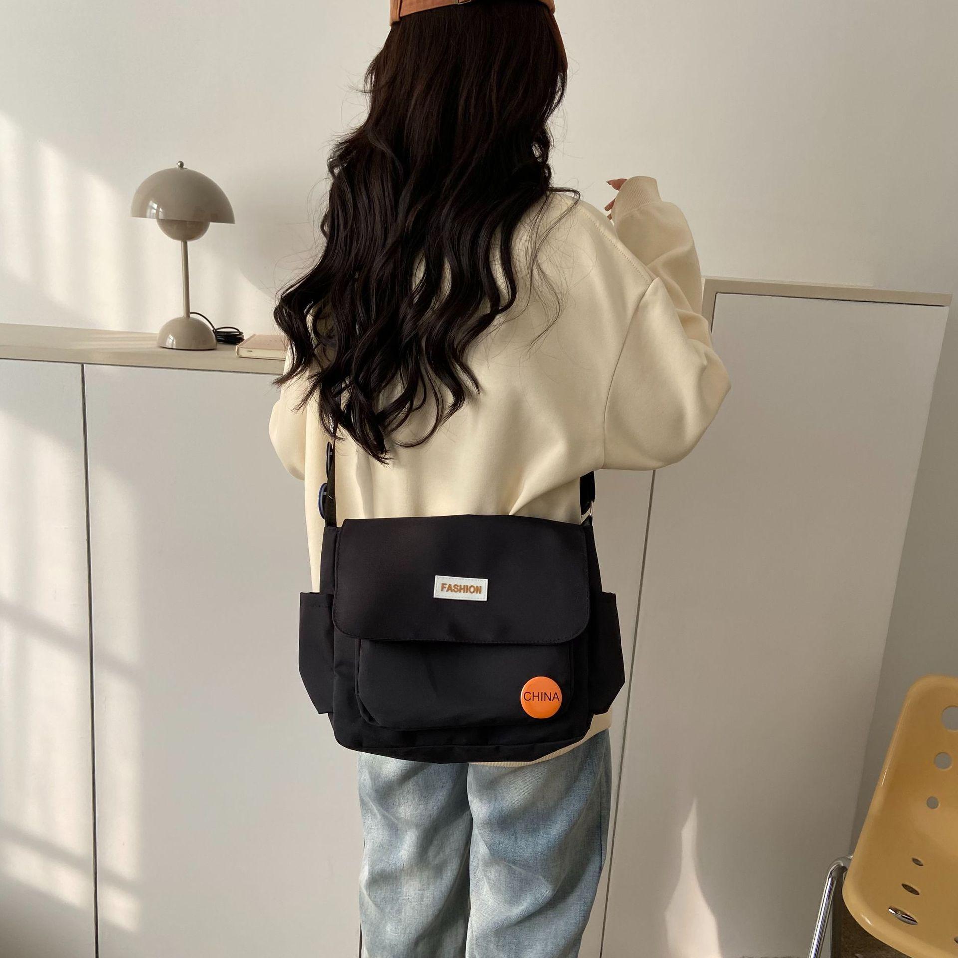 Spring new nylon big bag, student class shoulder messenger bag fashionable simple cute satchel bag 
Spring new nylon big bag, student class shoulder messenger bag fashionable simple cute satchel bag