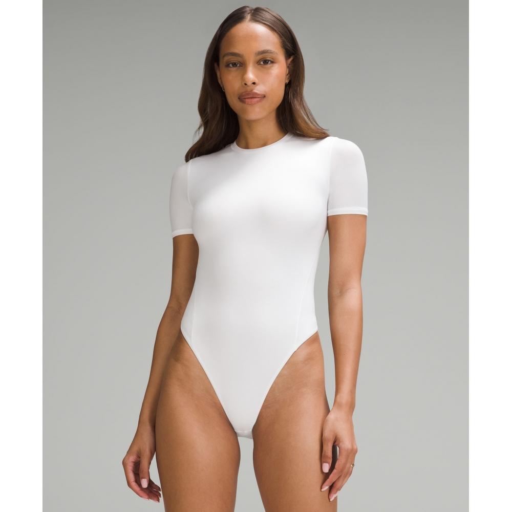 Lululemon Wundermost Ультрамягкий боди Nulu с короткими рукавами и стрингами, белый XS
Lululemon Wundermost Ультрамягкий боди Nulu с короткими рукавами и стрингами, белый XS