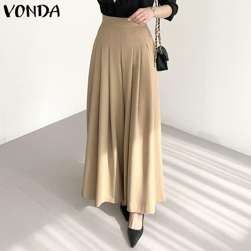 Женские однотонные свободные широкие брюки VONDA с высокой талией и плиссированными карманами
Женские однотонные свободные широкие брюки VONDA с высокой талией и плиссированными карманами