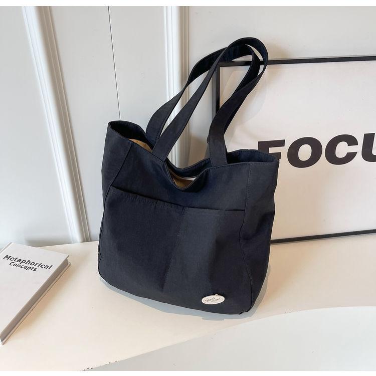 Новая корейская версия холщовой сумки через плечо большой вместимости, повседневная простая сумка-тоут для занятий для студента колледжа чёрный
Новая корейская версия холщовой сумки через плечо большой вместимости, повседневная простая сумка-тоут для занятий для студента колледжа чёрный