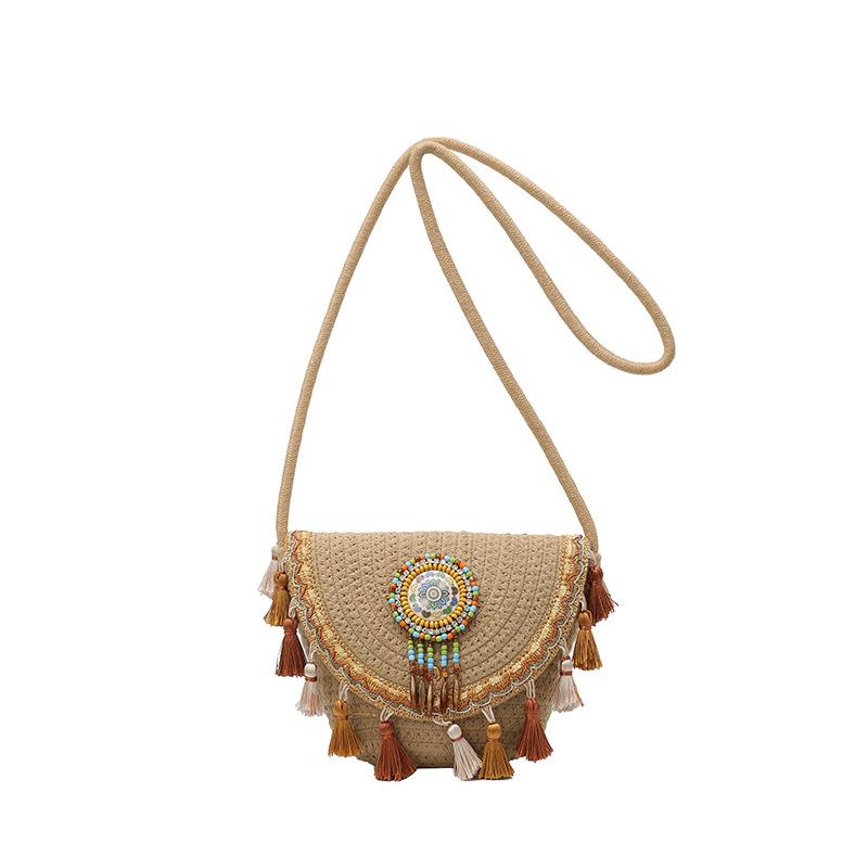 New simple national fashion popular straw bag fringed ball simple crossbody portable shoulder bag хакі
New simple national fashion popular straw bag fringed ball simple crossbody portable shoulder bag хакі