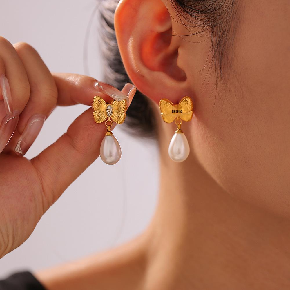 Korean Style Diamond Bow Tassel Faux Pearl Earrings - Women s 18k Gold-Plated Titanium Steel Fashion.
Korean Style Diamond Bow Tassel Faux Pearl Earrings - Women s 18k Gold-Plated Titanium Steel Fashion.