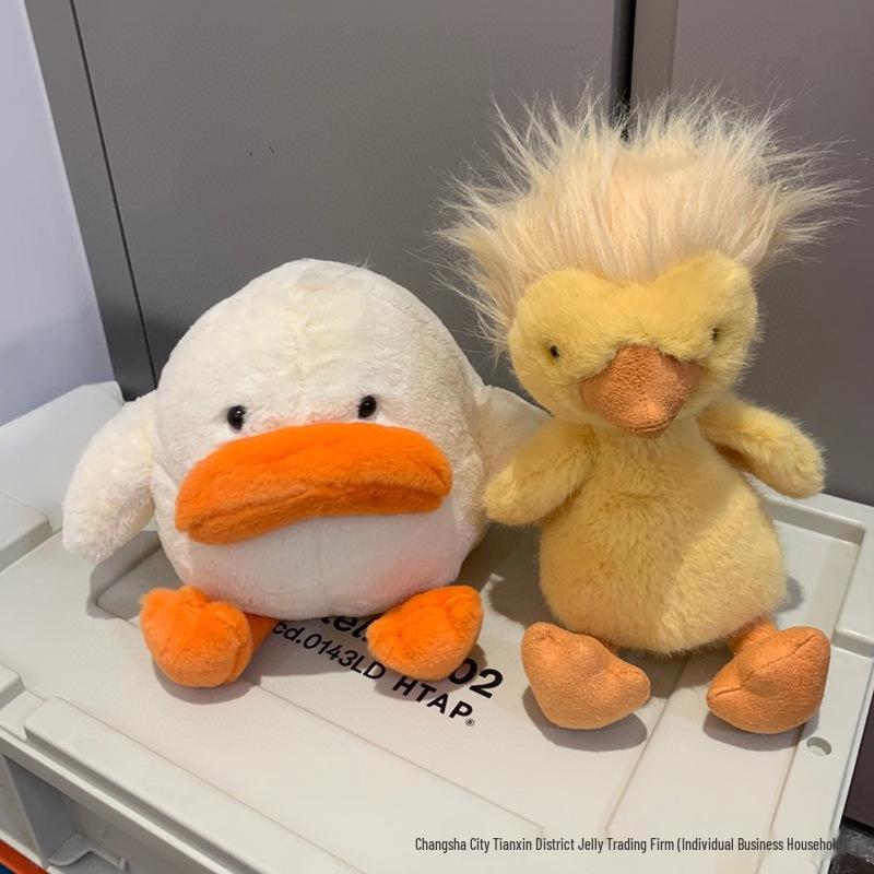 Frizzy Duck Plush Toy Doll - Cute and Comforting Gift for Friends Includes Blue Dust Bag
Frizzy Duck Plush Toy Doll - Cute and Comforting Gift for Friends Includes Blue Dust Bag