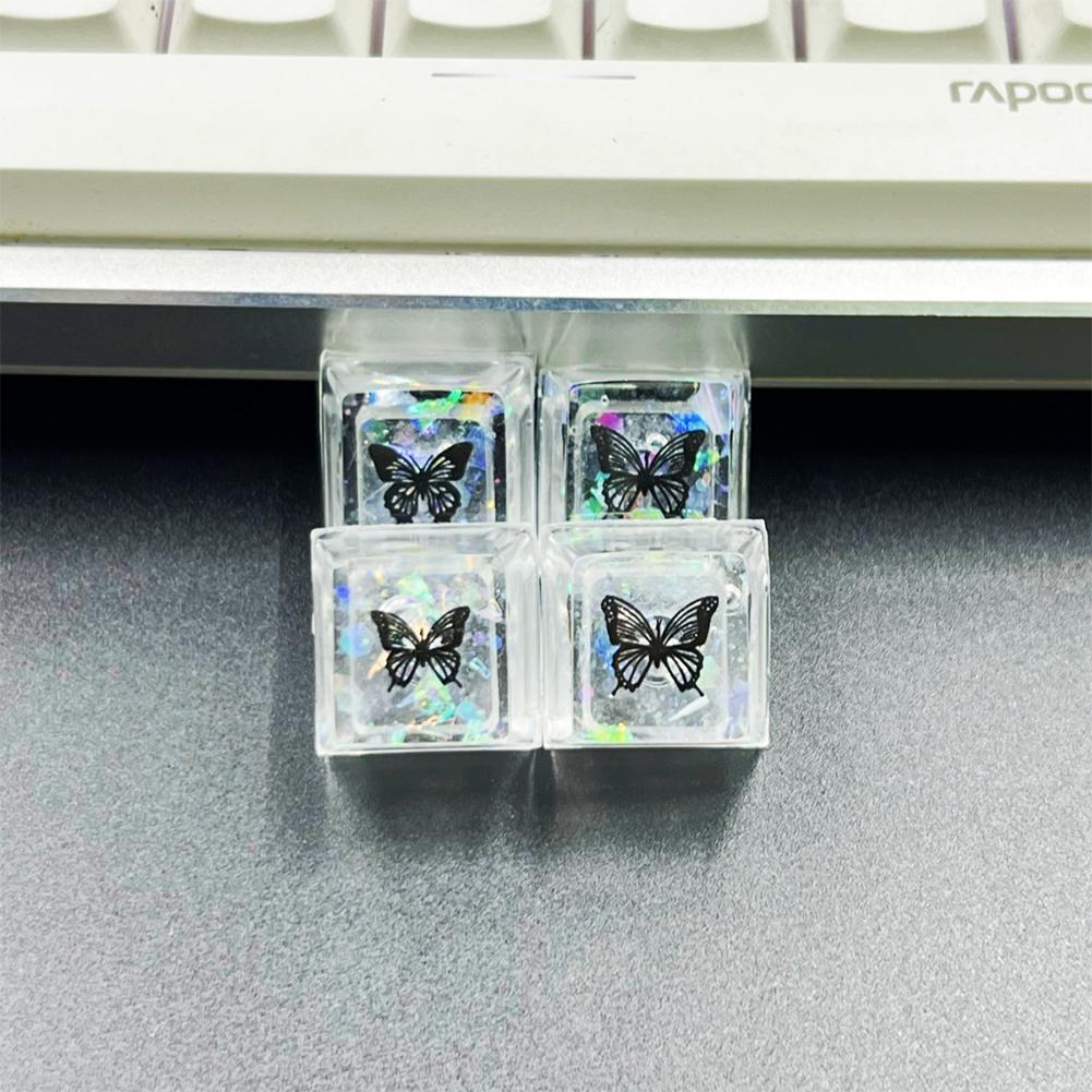 4 шт. новые полупрозрачные блестящие колпачки для клавиш в виде бабочек, перекрестные смоляные колпачки для механической клавиатуры с аксессуарами E
4 шт. новые полупрозрачные блестящие колпачки для клавиш в виде бабочек, перекрестные смоляные колпачки для механической клавиатуры с аксессуарами E