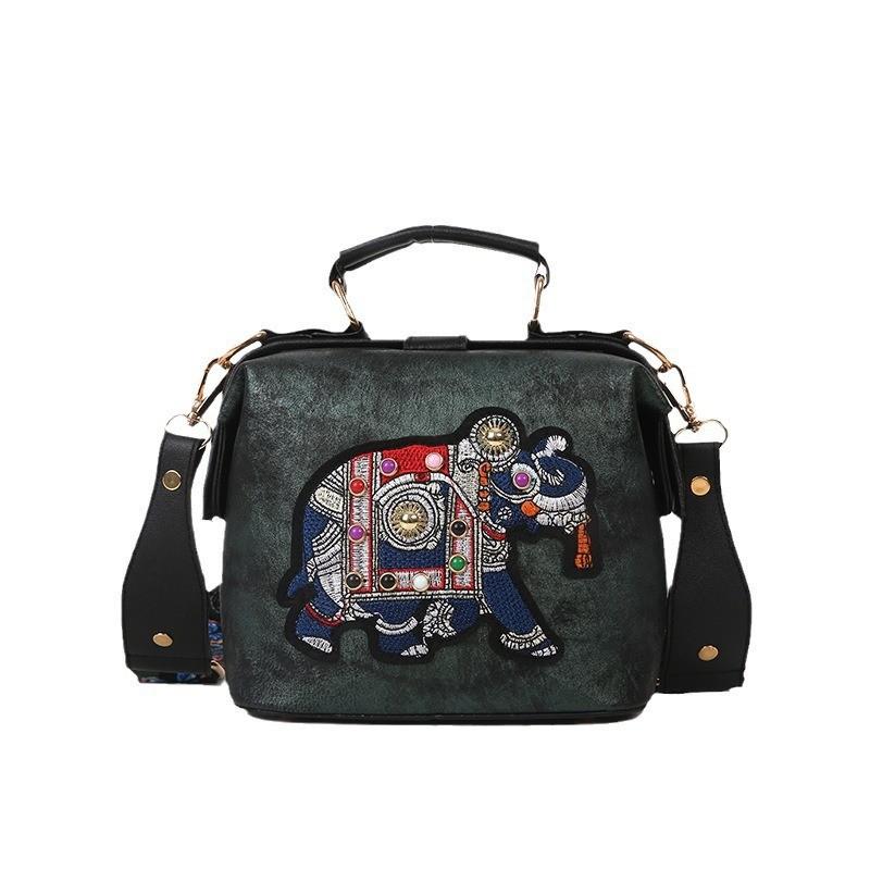 Doctor bag Thai embroidery bag Hot-selling cartoon elephant women bag Indian exotic portable messenger bag белый
Doctor bag Thai embroidery bag Hot-selling cartoon elephant women bag Indian exotic portable messenger bag белый