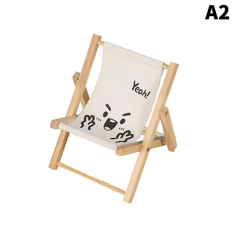 Cute Mini Wooden Beach Chair Phone Holder Foldable Model Photography Prop Decor Gift Idea Home Office Accessory
Cute Mini Wooden Beach Chair Phone Holder Foldable Model Photography Prop Decor Gift Idea Home Office Accessory