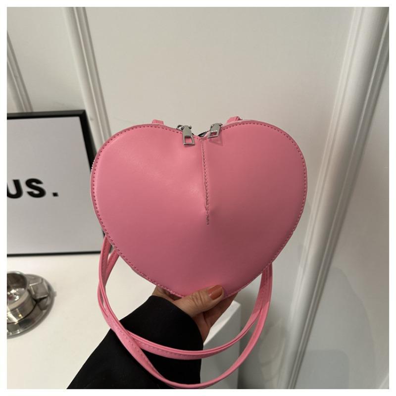 New fashion personality sub-shell love foreign style solid color small peach heart cute personality trendy shoulder messenger women s bag рожевий
New fashion personality sub-shell love foreign style solid color small peach heart cute personality trendy shoulder messenger women s bag рожевий