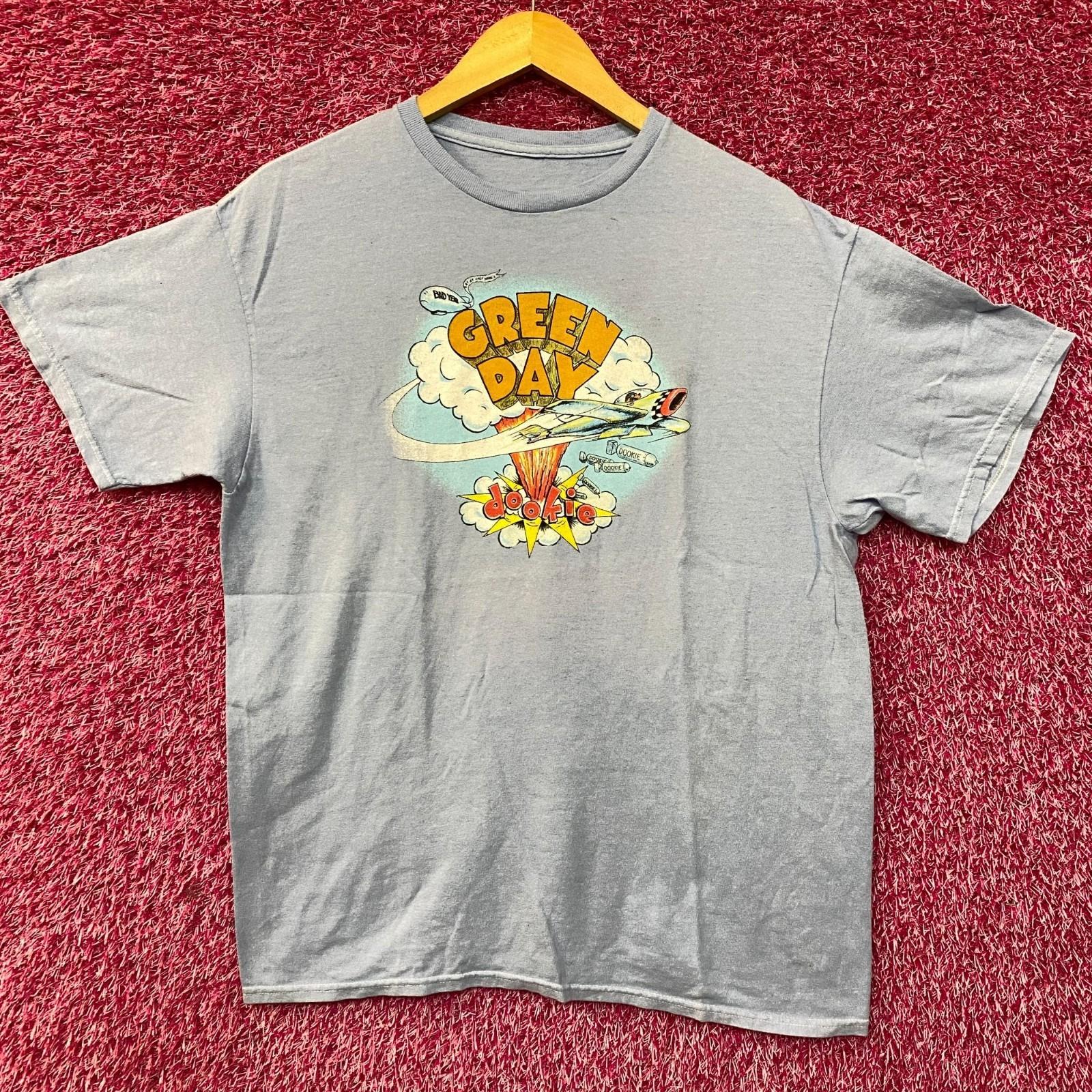 Green Day Blue Dookie Tshirt size Medium XXL
Green Day Blue Dookie Tshirt size Medium XXL