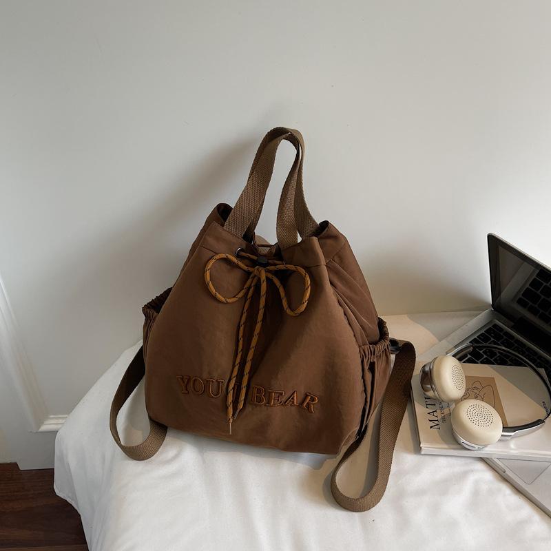 Корейский нишевый мешок-ведро на шнурке в стиле Мори, популярный мешок для воды, осень 2025, новая простая тканевая сумка, женская сумка через плечо темно-коричневого
Корейский нишевый мешок-ведро на шнурке в стиле Мори, популярный мешок для воды, осень 2025, новая простая тканевая сумка, женская сумка через плечо темно-коричневого