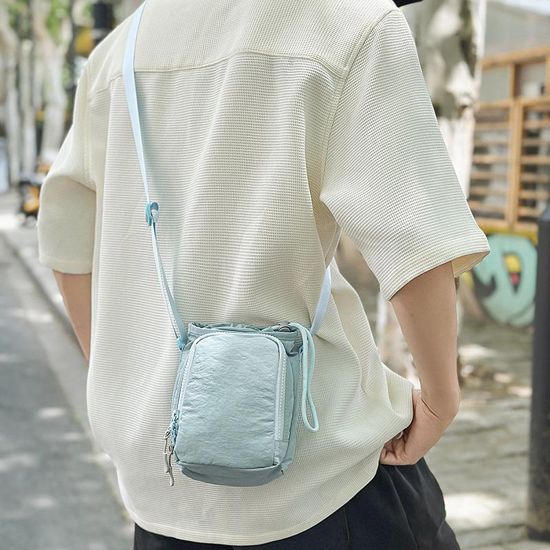 Mobile phone bag Student men s and women s kettle bag Umbrella bag Two-layer shoulder messenger bag Going out Water cup Versatile satchel чорний
Mobile phone bag Student men s and women s kettle bag Umbrella bag Two-layer shoulder messenger bag Going out Water cup Versatile satchel чорний