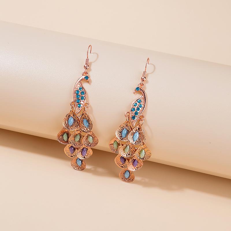 Medium and long fashionable retro big peacock earrings retro fan earrings multi-layer crystal earrings
Medium and long fashionable retro big peacock earrings retro fan earrings multi-layer crystal earrings