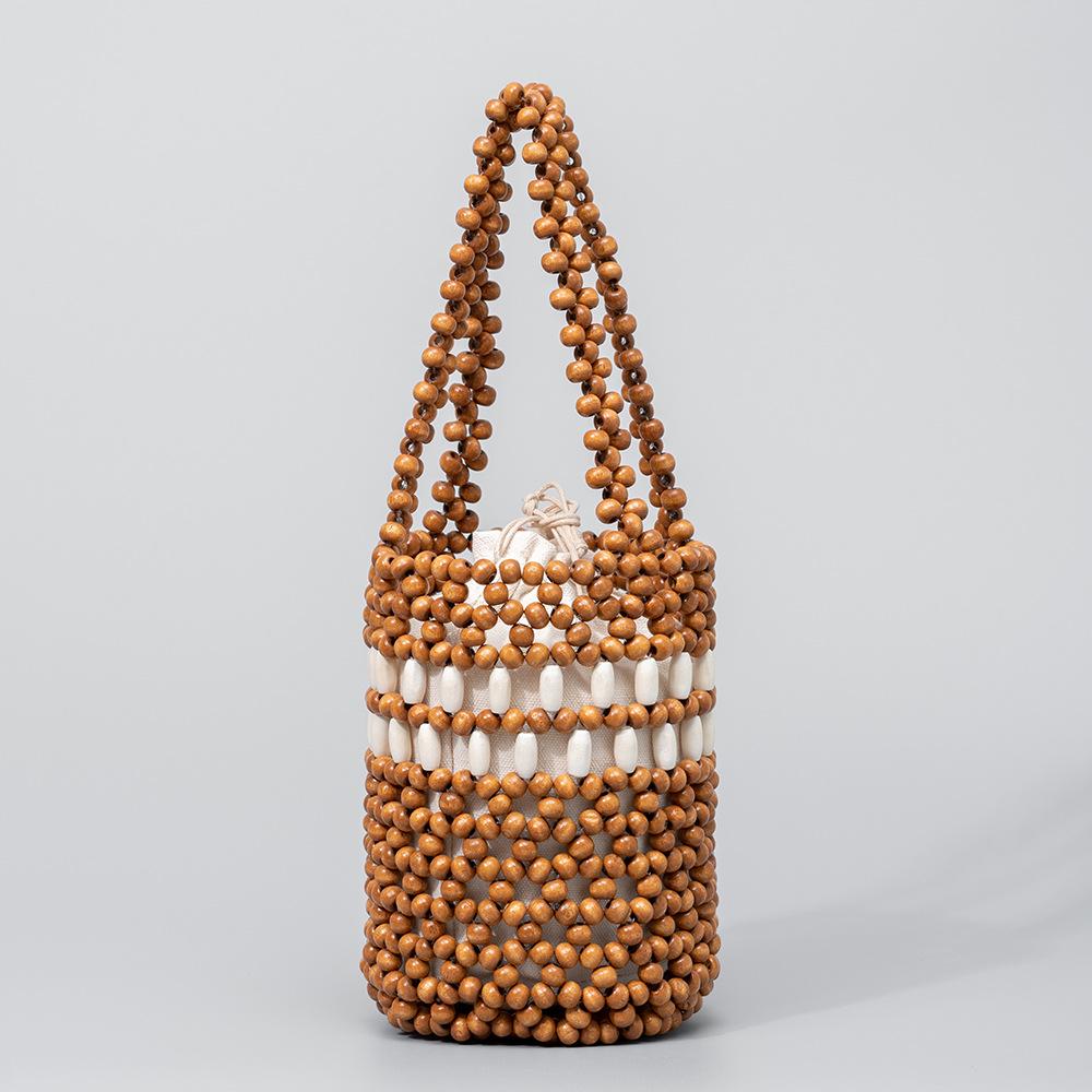 Casual Beach Color Beading Bucket Bags Summer Handmade Wooden Beads Handbags Hollow Out Tote Bags for Women Ladies Clutch Purses 12x12x17cm колір світло кави
Casual Beach Color Beading Bucket Bags Summer Handmade Wooden Beads Handbags Hollow Out Tote Bags for Women Ladies Clutch Purses 12x12x17cm колір світло кави