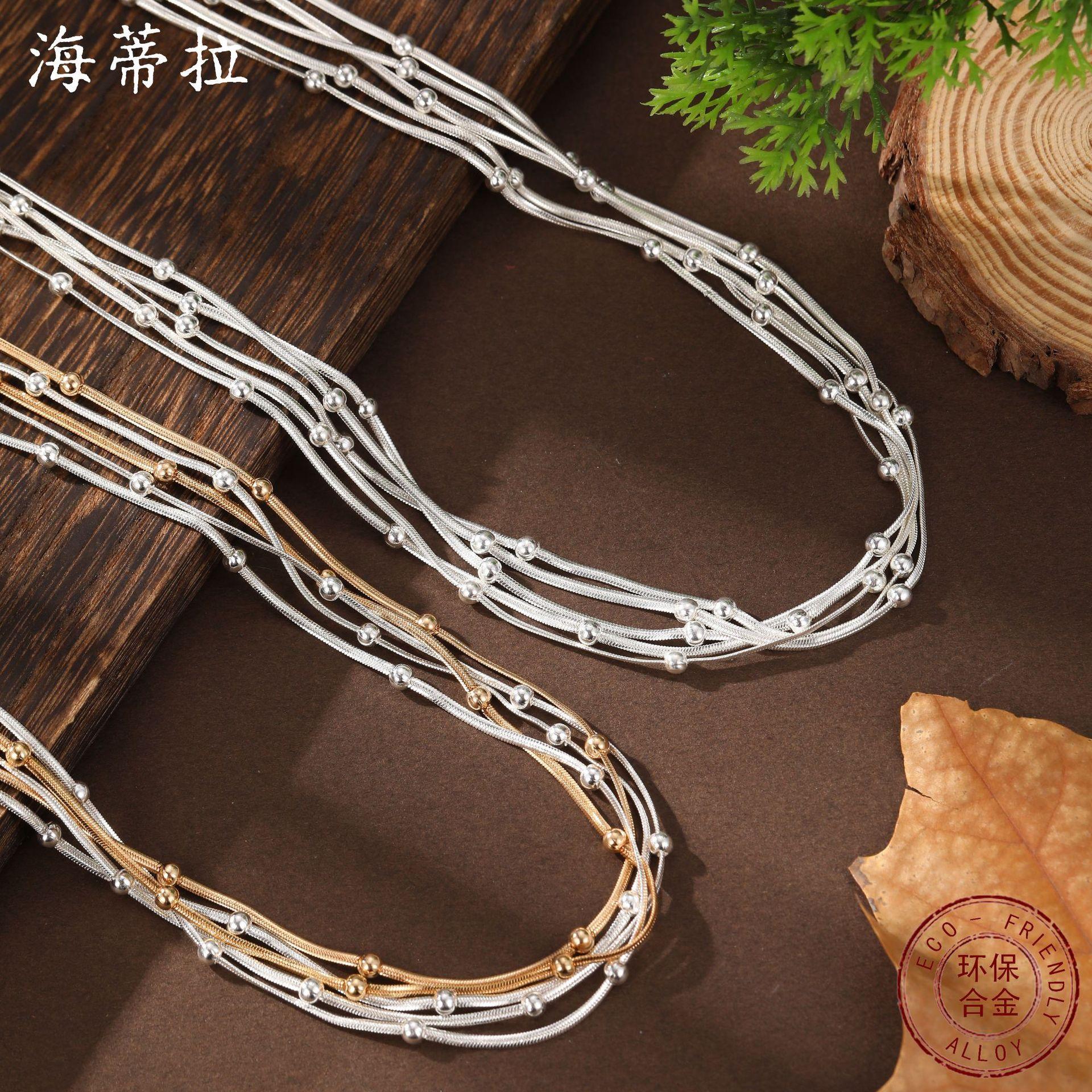 Five-layer snake bone bead necklace, high-end stacking effect women s gold and silver two-color magnetic buckle neck chain
Five-layer snake bone bead necklace, high-end stacking effect women s gold and silver two-color magnetic buckle neck chain