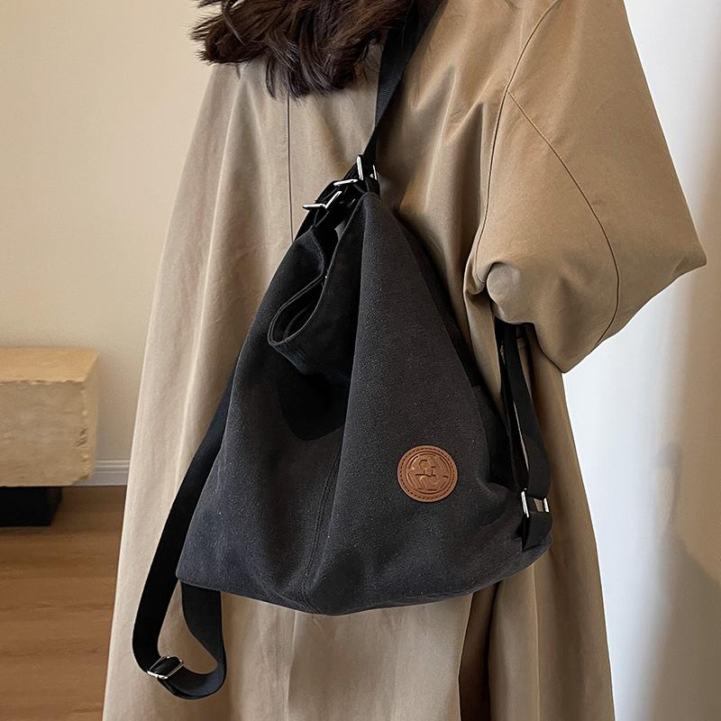 Canvas bag women s large-capacity new summer versatile messenger bag backpack premium tote bag чорний
Canvas bag women s large-capacity new summer versatile messenger bag backpack premium tote bag чорний