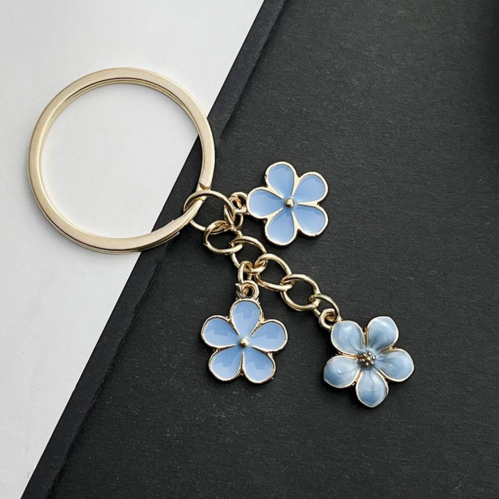 Sakura Oil Drop Keychain – Available in Black, White, Blue, Pink, Purple | Multiple Colors and Metal Parts | Luggage Accessory
Sakura Oil Drop Keychain – Available in Black, White, Blue, Pink, Purple | Multiple Colors and Metal Parts | Luggage Accessory