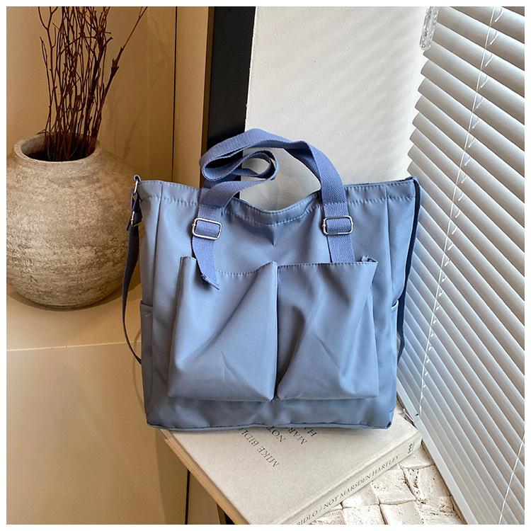 Жіноча сумка, нова модна дорожня сумка через плече, велика містка сумка для студентів, японська та корейська полотняна сумка з подвійною кишенею синій
Жіноча сумка, нова модна дорожня сумка через плече, велика містка сумка для студентів, японська та корейська полотняна сумка з подвійною кишенею синій