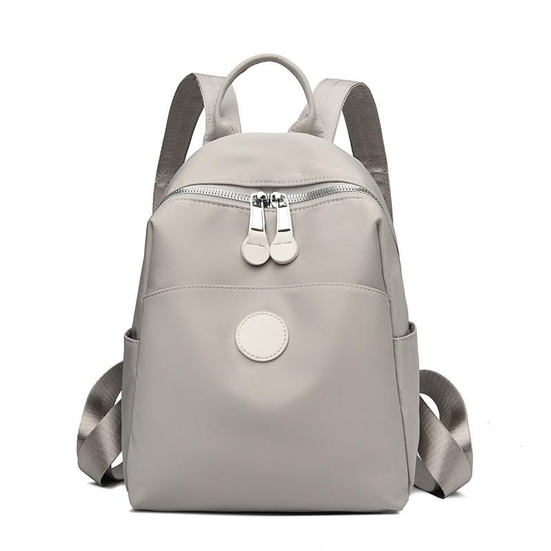 Весенний женский модный нейлоновый водонепроницаемый дорожный и городской небольшой рюкзак простой холщовый школьный портфель светло-серый
Весенний женский модный нейлоновый водонепроницаемый дорожный и городской небольшой рюкзак простой холщовый школьный портфель светло-серый