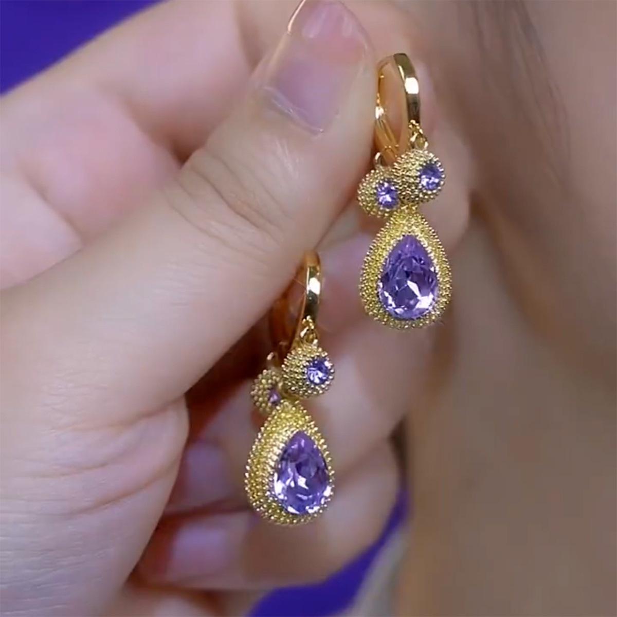 New trendy champagne zircon durian earrings for women, design temperament versatile ear buckle earrings фіолетовий
New trendy champagne zircon durian earrings for women, design temperament versatile ear buckle earrings фіолетовий