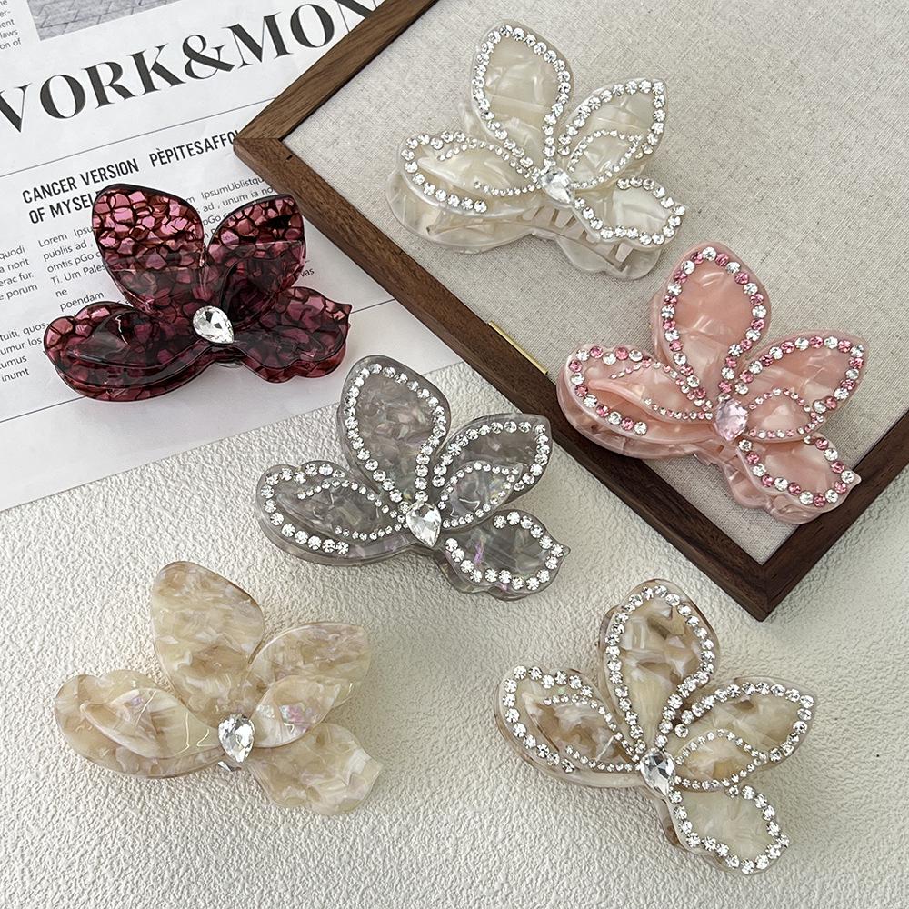 Bougainvillea Rhinestone Triangle Hair Clip - Three-Dimensional Acetate Flower Claw for Ponytails
Bougainvillea Rhinestone Triangle Hair Clip - Three-Dimensional Acetate Flower Claw for Ponytails
