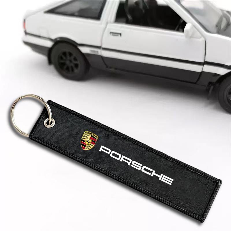 Вышитый брелок для ключей мотоцикла для Porsche Boxster Cayman Cayenne 911 Macan Panamera Taycan 718 Брелок Аксессуары для автостайлинга
Вышитый брелок для ключей мотоцикла для Porsche Boxster Cayman Cayenne 911 Macan Panamera Taycan 718 Брелок Аксессуары для автостайлинга