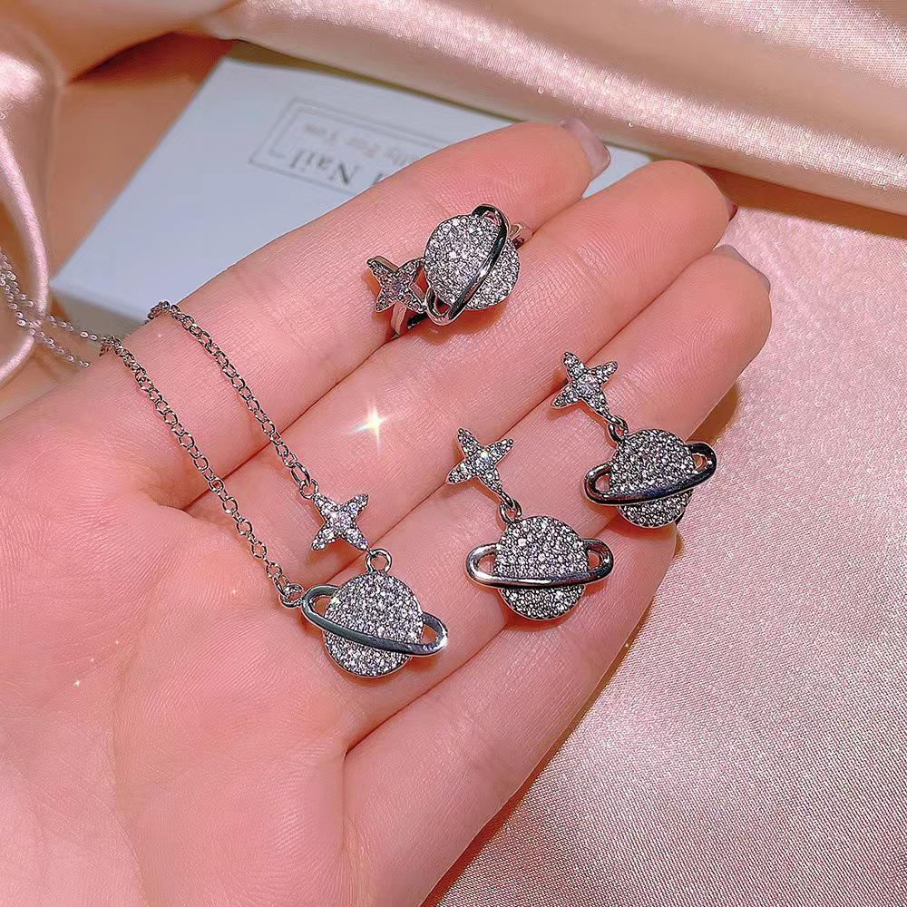 Japanese and Korean Planet Necklace Set: Titanium Steel Clavicle Chain, Earrings, and Ring Women s Trio
Japanese and Korean Planet Necklace Set: Titanium Steel Clavicle Chain, Earrings, and Ring Women s Trio