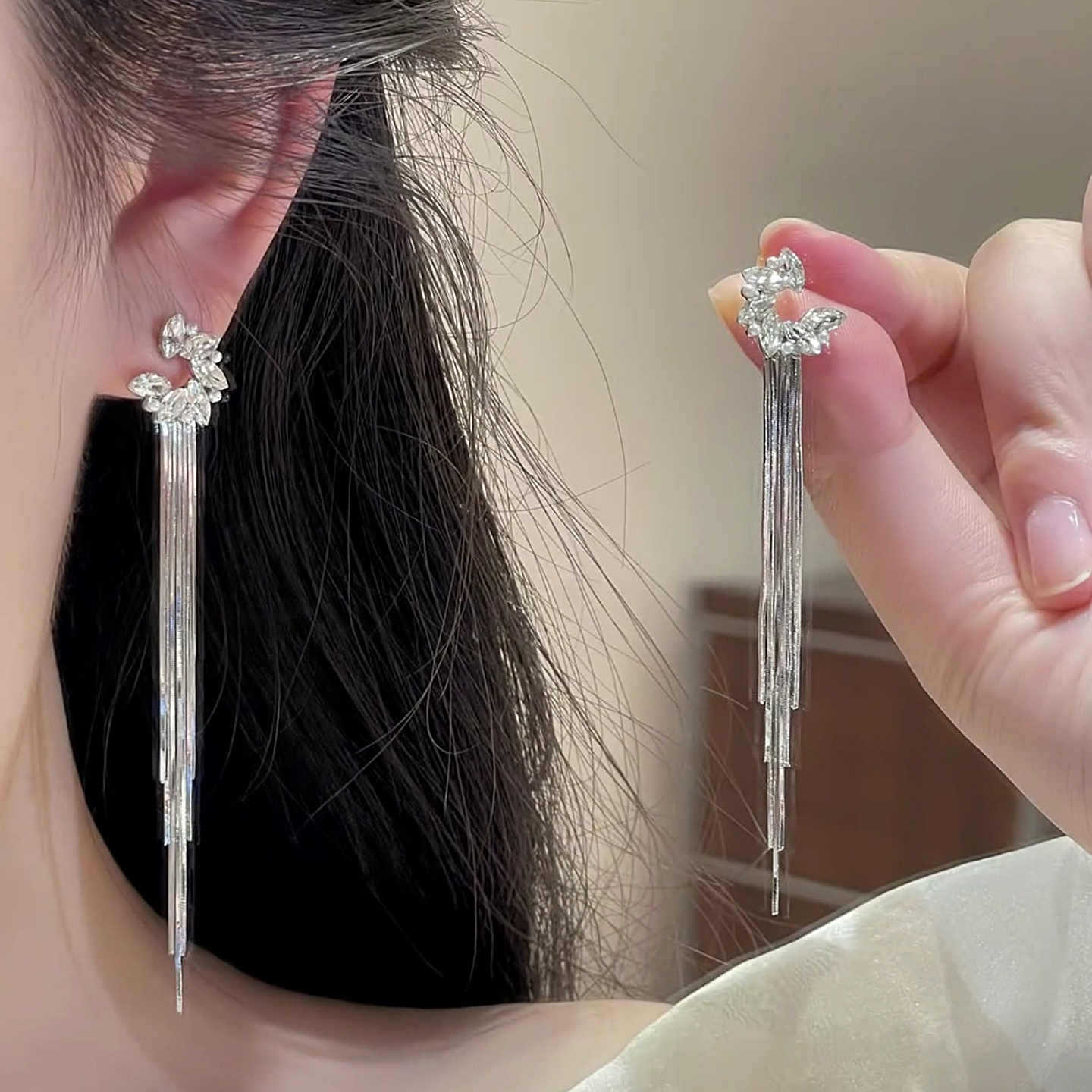 French light luxury moon tassel long earrings temperament exquisite gentle sweet high sense cold wind stud earrings
French light luxury moon tassel long earrings temperament exquisite gentle sweet high sense cold wind stud earrings