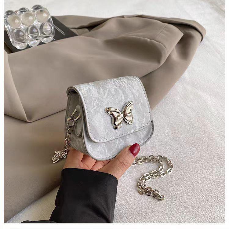 Маленька сумка, жіноча сумка через плече на ланцюжку, літня срібляста міні-сумка срібний
Маленька сумка, жіноча сумка через плече на ланцюжку, літня срібляста міні-сумка срібний