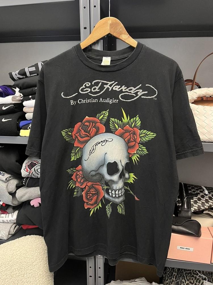 Ed Hardy від Christian Audigier Чорна коротка унісекс футболка з принтом черепа KH7138 Унісекс футболка XXL
Ed Hardy від Christian Audigier Чорна коротка унісекс футболка з принтом черепа KH7138 Унісекс футболка XXL