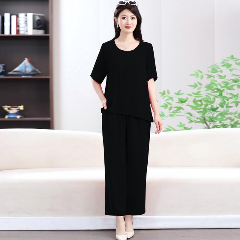 Chic Summer Set: Round Neck T-Shirt & Solid Color Two-Piece for Middle-Aged & Elderly Women 2026 3XL (130-145 lbs) чорний
Chic Summer Set: Round Neck T-Shirt & Solid Color Two-Piece for Middle-Aged & Elderly Women 2026 3XL (130-145 lbs) чорний
