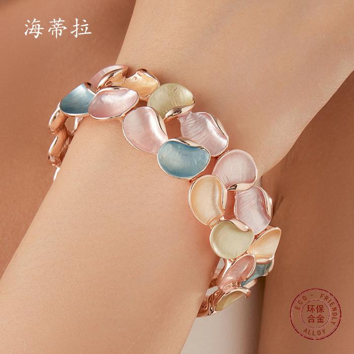 Two rows of colored petal alloy elastic bracelet, handmade dripping flower shape women s bracelet elastic adjustable
Two rows of colored petal alloy elastic bracelet, handmade dripping flower shape women s bracelet elastic adjustable