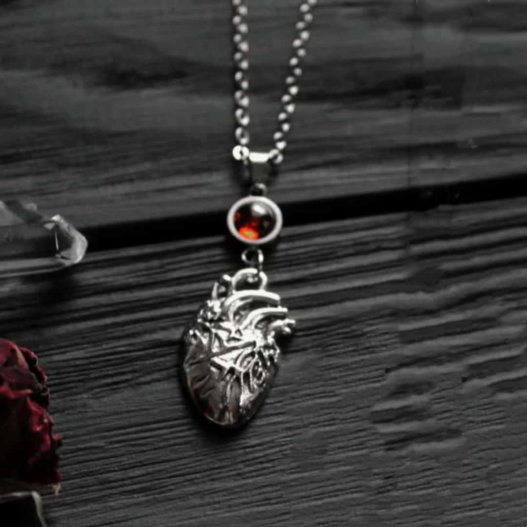 Gothic Punk Sliver Color Hollowed-out Rib Skeleton Anatomy Heart Shape Pendant Necklace for Women Halloween Witchcraft Jewelry
Gothic Punk Sliver Color Hollowed-out Rib Skeleton Anatomy Heart Shape Pendant Necklace for Women Halloween Witchcraft Jewelry