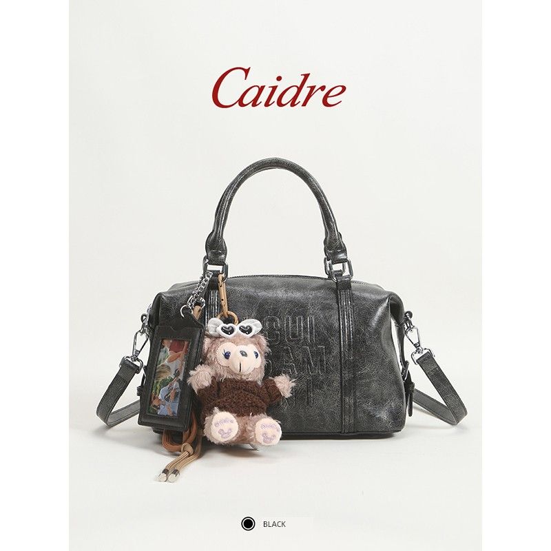 Caidre Bag Female 2025 New Arrival Niche Style Bowling Handbag Work Clothing Shoulder Crossbody Boston Pillow Bag Black with pendant
Caidre Bag Female 2025 New Arrival Niche Style Bowling Handbag Work Clothing Shoulder Crossbody Boston Pillow Bag Black with pendant