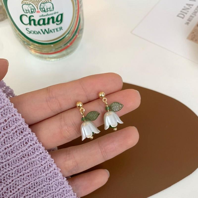 Срібні сережки з квітами тюльпанів: Простий корейський стиль із кришталевими перлами
Срібні сережки з квітами тюльпанів: Простий корейський стиль із кришталевими перлами