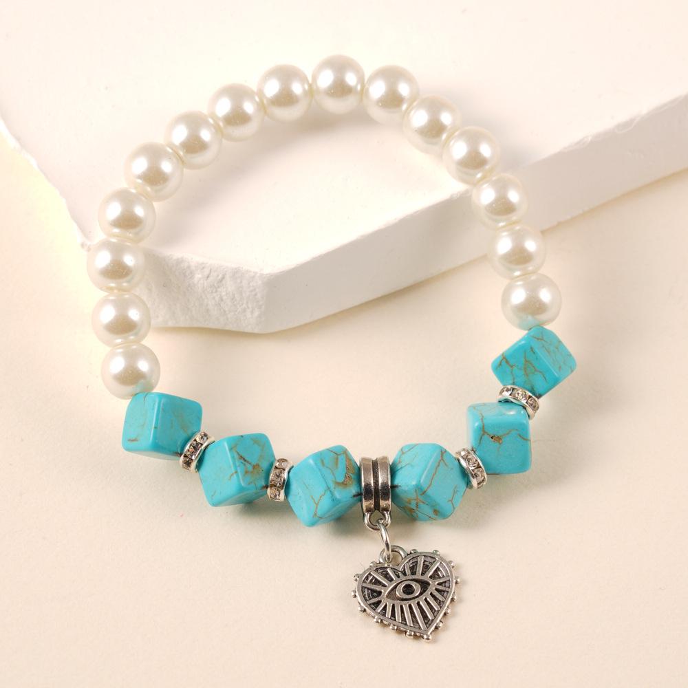 Pearl Turquoise Beaded Bracelet with Heart Pendant - Fashionable DIY Elastic Design for Women
Pearl Turquoise Beaded Bracelet with Heart Pendant - Fashionable DIY Elastic Design for Women