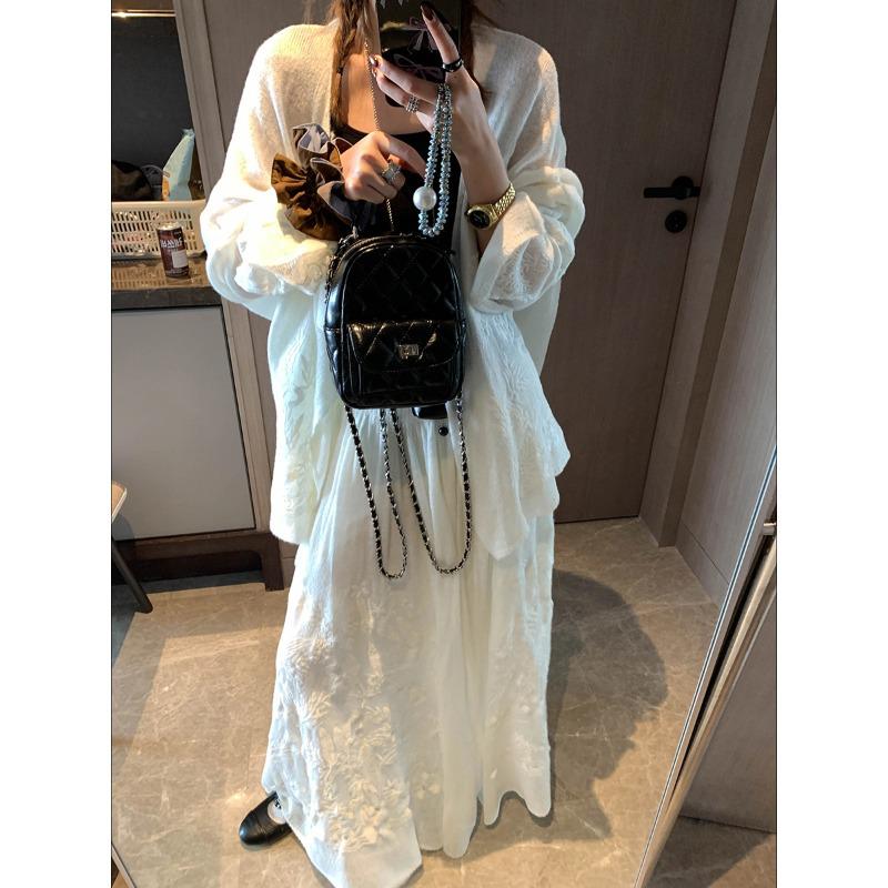 Mochie Embroidered Jacquard Cardigan & Elastic High-Waist Skirt Set MQ1169 One Size
Mochie Embroidered Jacquard Cardigan & Elastic High-Waist Skirt Set MQ1169 One Size