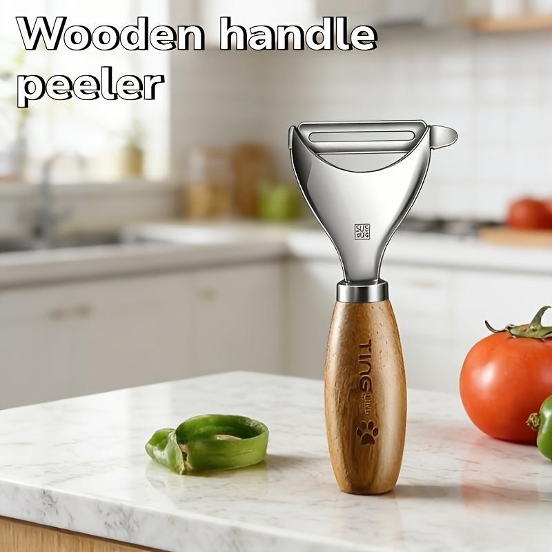 Round-log-handle Freestanding Peeler, Featuring a Standing Design, Sharp and Durable Stainless Steel Blade, Ergonomic Handle for a Comfortable Grip Round Wood Handle Stand-Up Peeler
Round-log-handle Freestanding Peeler, Featuring a Standing Design, Sharp and Durable Stainless Steel Blade, Ergonomic Handle for a Comfortable Grip Round Wood Handle Stand-Up Peeler