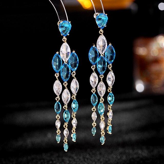 Новинка 2022, массивные висячие серьги с кисточками и кристаллами для дам, милые длинные серьги с фианитом, роскошные ювелирные изделия
Новинка 2022, массивные висячие серьги с кисточками и кристаллами для дам, милые длинные серьги с фианитом, роскошные ювелирные изделия