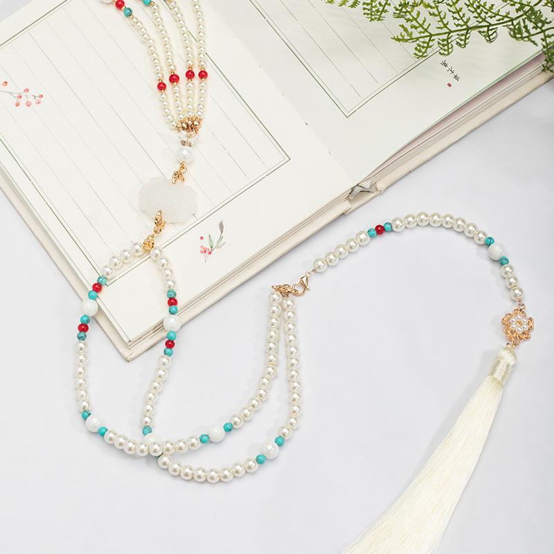 Ancient Style Cloud Backed Tassel Necklace
Ancient Style Cloud Backed Tassel Necklace
