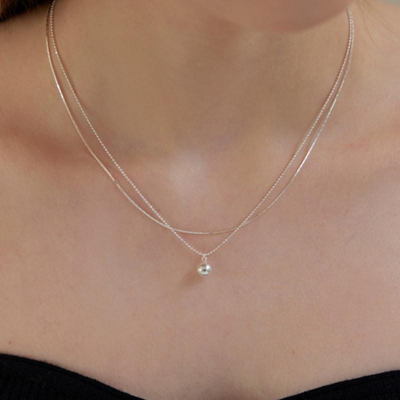 Кольє з блискучого багатошарового ланцюжка з кульками Silver
Кольє з блискучого багатошарового ланцюжка з кульками Silver