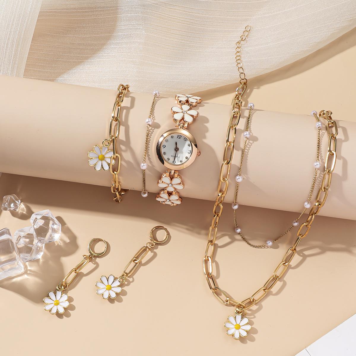 Ladies Versatile Gift Set: Fashion Floral Chain English Watch & Daisy 5-Piece Set.
Ladies Versatile Gift Set: Fashion Floral Chain English Watch & Daisy 5-Piece Set.