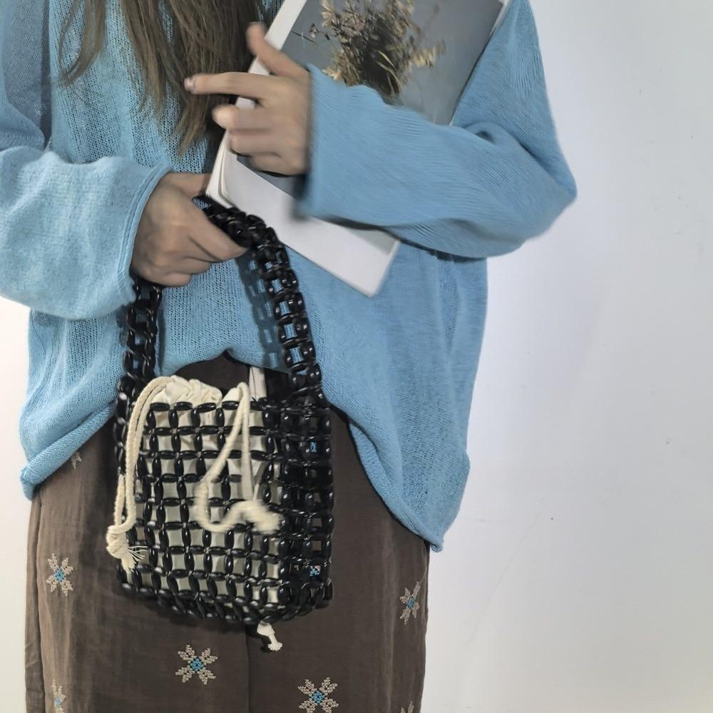 Handmade Beaded Woven Bag Pure Color Openwork Bag Portable Hollow Out Bag Vacation Beach чорний
Handmade Beaded Woven Bag Pure Color Openwork Bag Portable Hollow Out Bag Vacation Beach чорний