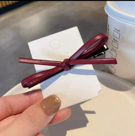 Women s Simple Black Leather Bow Hair Clip - Sweet, Cool Bangs and Side Accessory.
Women s Simple Black Leather Bow Hair Clip - Sweet, Cool Bangs and Side Accessory.