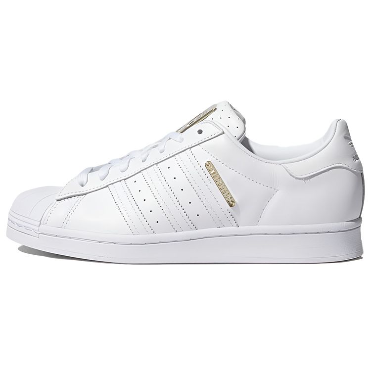 Adidas Женские кроссовки Superstar Badge of Gold Белое облако-белое золото-металлик FW3713
Adidas Женские кроссовки Superstar Badge of Gold Белое облако-белое золото-металлик FW3713