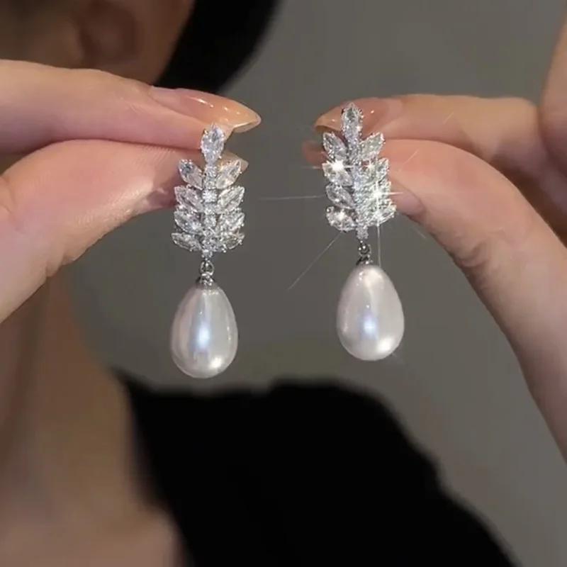 Exquisite Zircon Wheat Pearl Pendant Earrings For Women Fashionable Personalized Daily Accessory Party Zircon Birthday Gifts
Exquisite Zircon Wheat Pearl Pendant Earrings For Women Fashionable Personalized Daily Accessory Party Zircon Birthday Gifts
