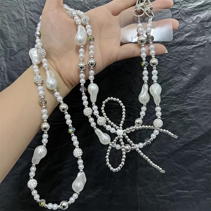 Elegant Pearl Bow Diamond Ball Phone Chain, Crossbody & Shoulder Strap Camera Lanyard, Versatile Bag Charm Accessory for Women
Elegant Pearl Bow Diamond Ball Phone Chain, Crossbody & Shoulder Strap Camera Lanyard, Versatile Bag Charm Accessory for Women