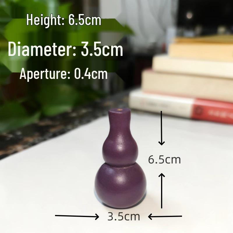 Подвеска-украшение из массива дерева в форме тыквы с фиолетовой кожей
Подвеска-украшение из массива дерева в форме тыквы с фиолетовой кожей