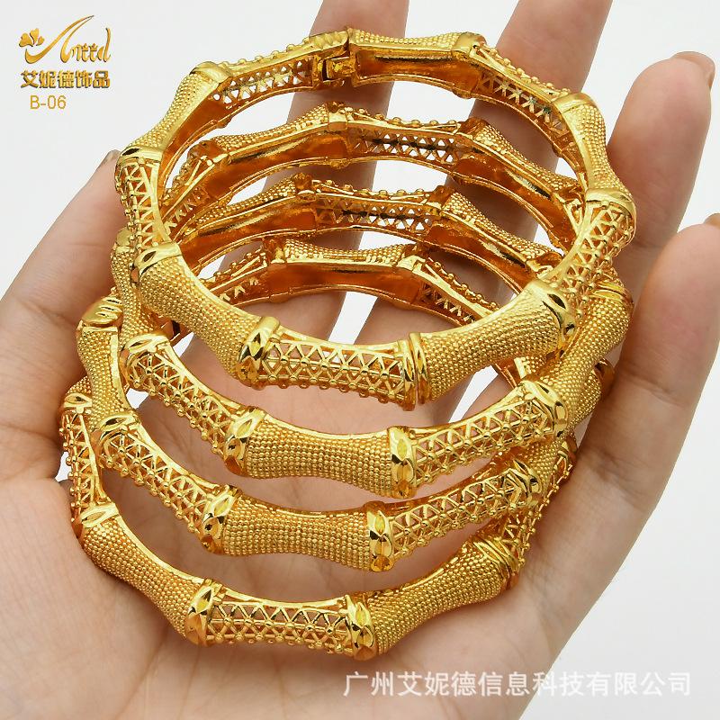 Дубай Лучший браслет из сплава 24k Нигерийский женский свадебный золотой браслет
Дубай Лучший браслет из сплава 24k Нигерийский женский свадебный золотой браслет