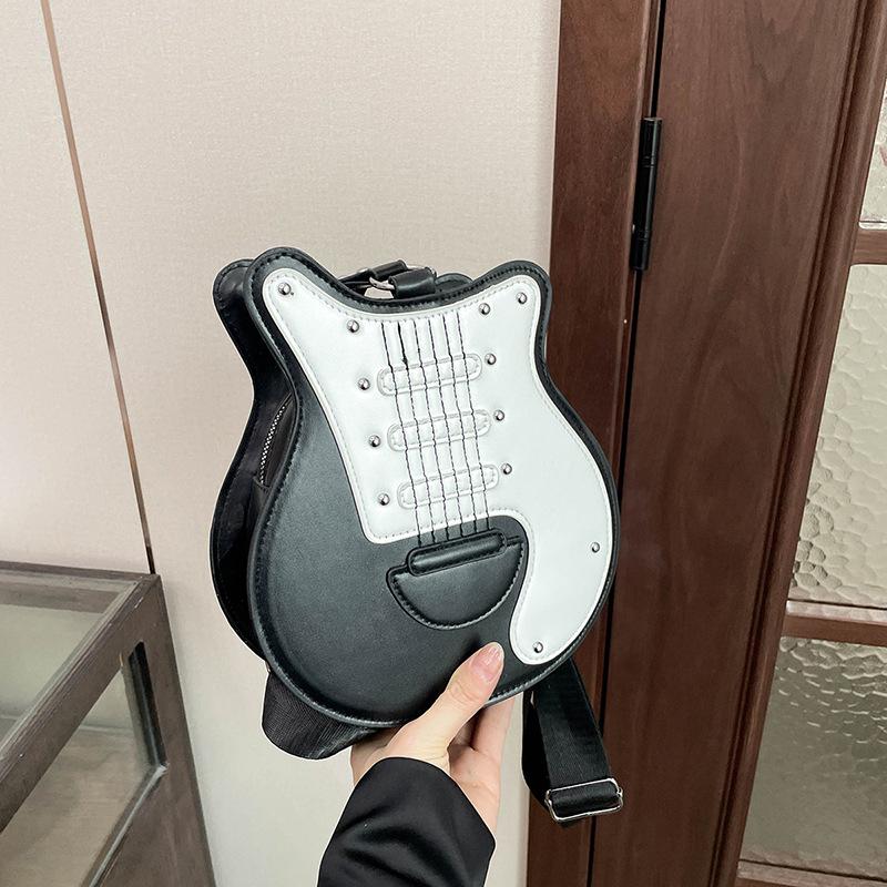 Personalized casual spring new guitar shape shoulder bag women s commuter niche design high-end messenger bag чорний
Personalized casual spring new guitar shape shoulder bag women s commuter niche design high-end messenger bag чорний