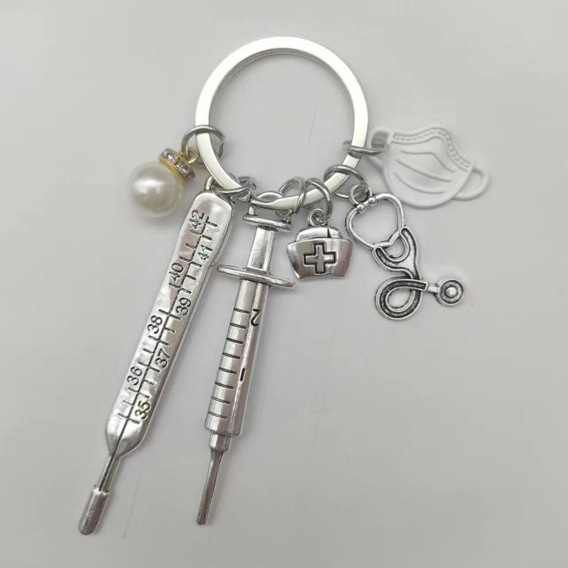 Medical Keychain Gift Set: Thermometer, Stethoscope, Mask, Cross Injector білий
Medical Keychain Gift Set: Thermometer, Stethoscope, Mask, Cross Injector білий
