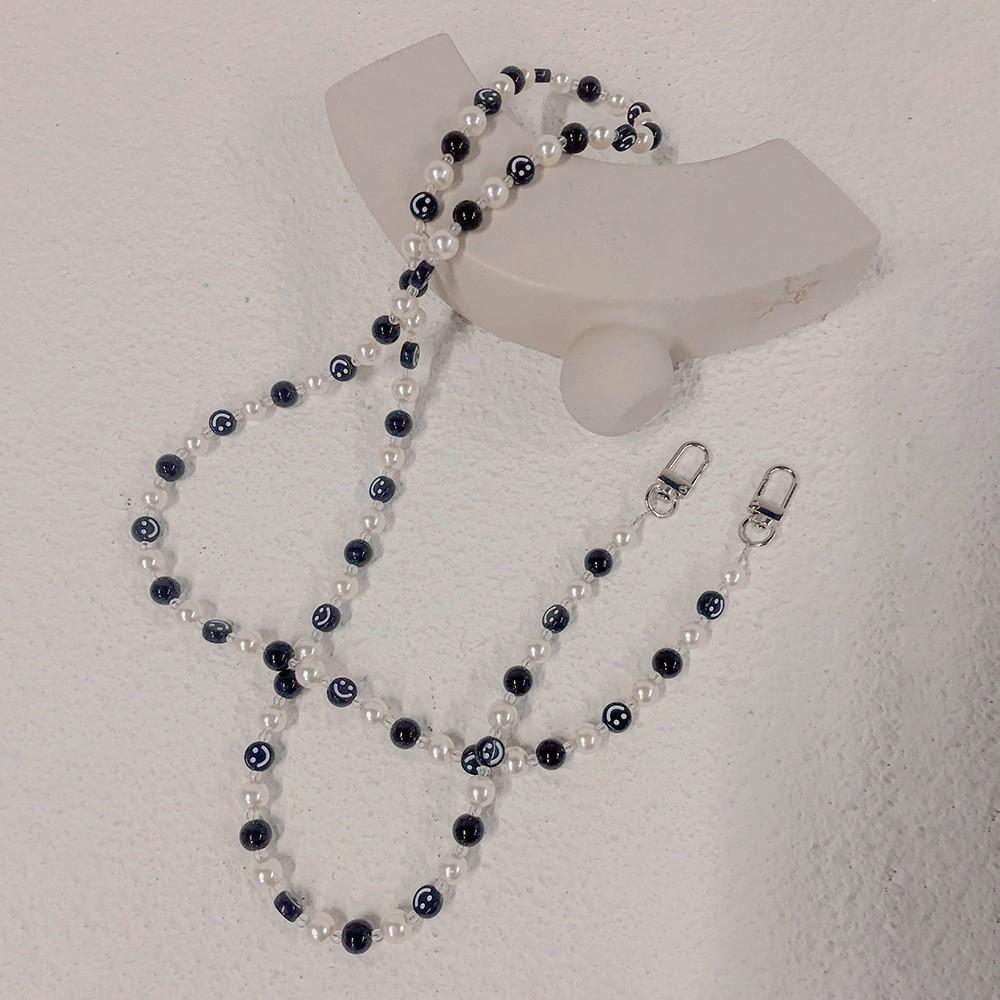 South Korea Dongdaemun new INS style black and white pearl smiley face anti-loss portable oblique cross hand carry fashion chain mobile phone chain
South Korea Dongdaemun new INS style black and white pearl smiley face anti-loss portable oblique cross hand carry fashion chain mobile phone chain